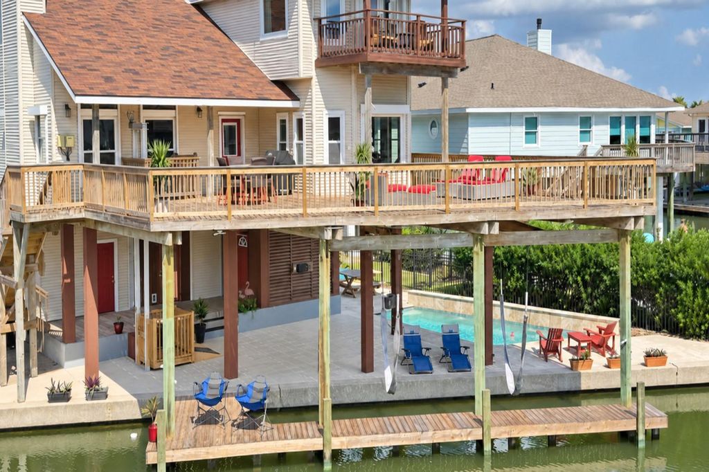 107 Bamaku Bnd, Tiki Island, TX 77554 cover photo. Doors Open Tour advertisement.