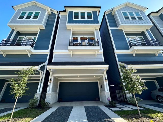 1216 W 21st St — West 21st Street Homes