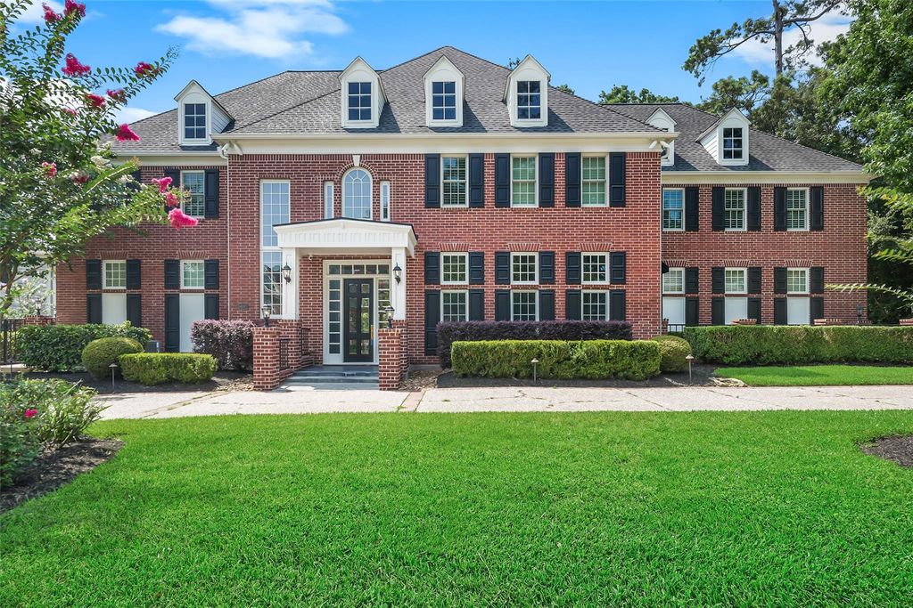 Grand living space with double-sided brick fireplace