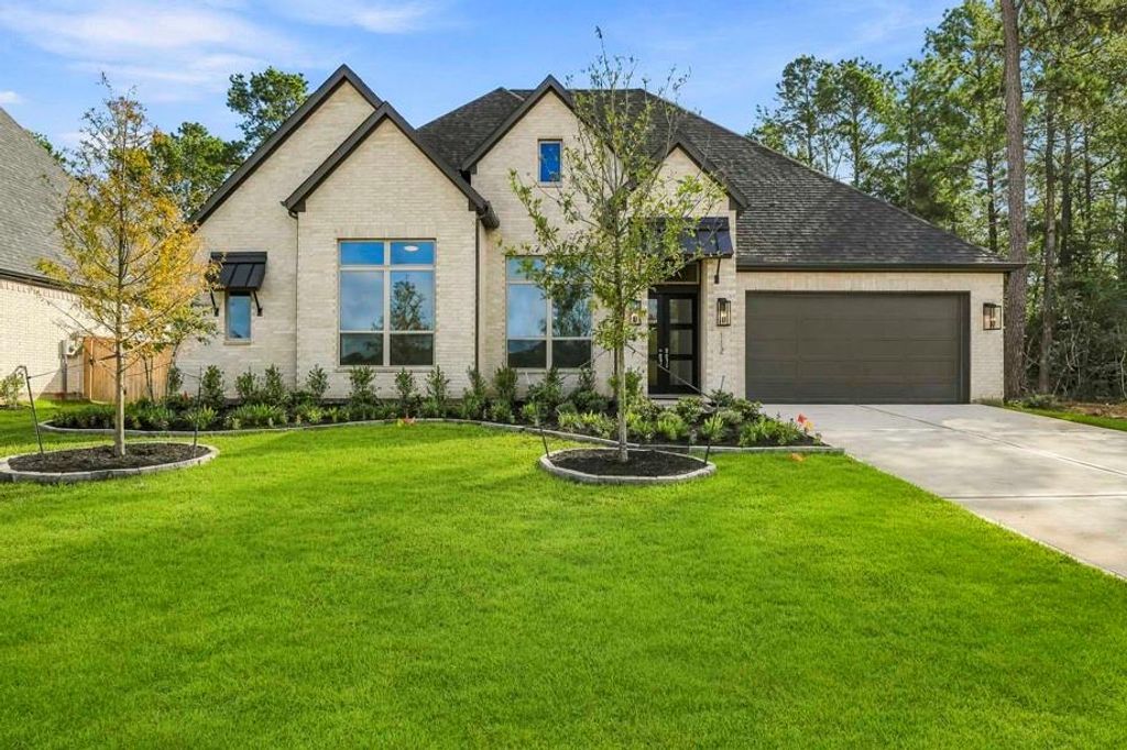 112 Jubilee Meadow Dr, Willis, TX 77318 cover photo. Doors Open Tour advertisement.