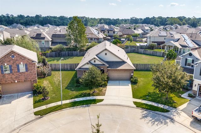  39415 Winding Pass Ln, Magnolia, TX 77354