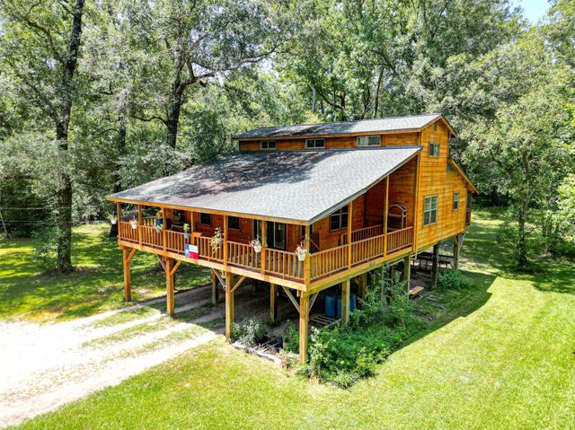  16 Magnolia Rd, Woodbranch, TX 77357