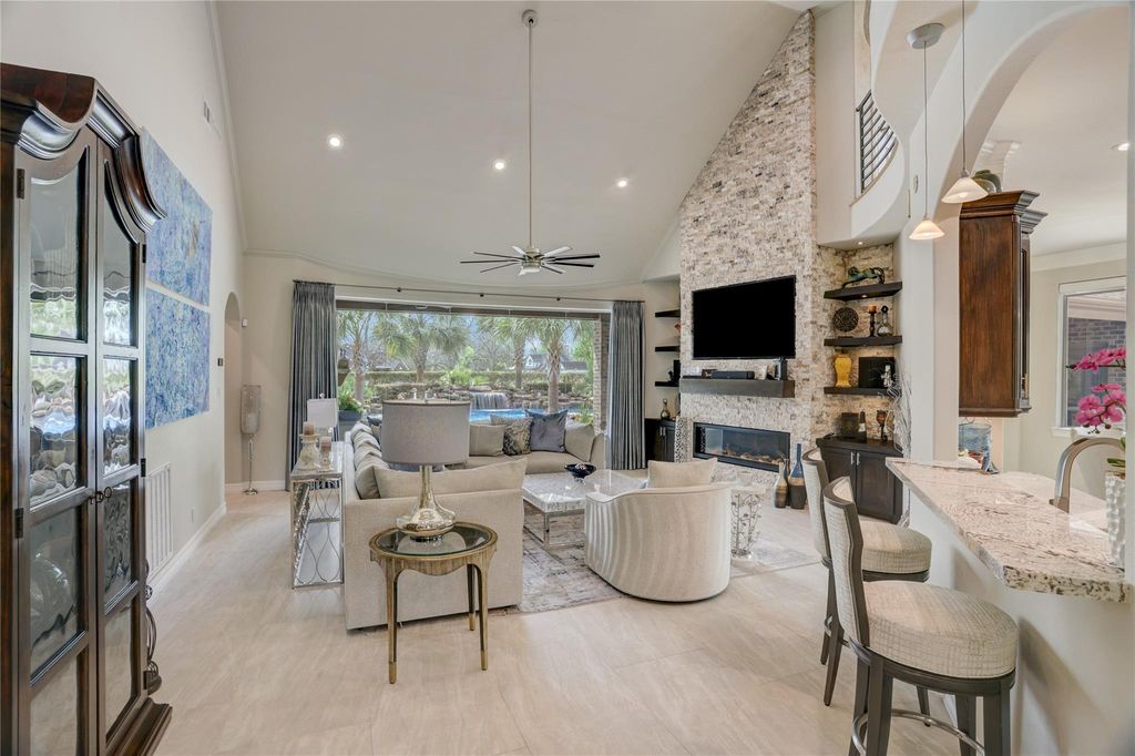 Living Room — Vaulted Ceiling & Pool View