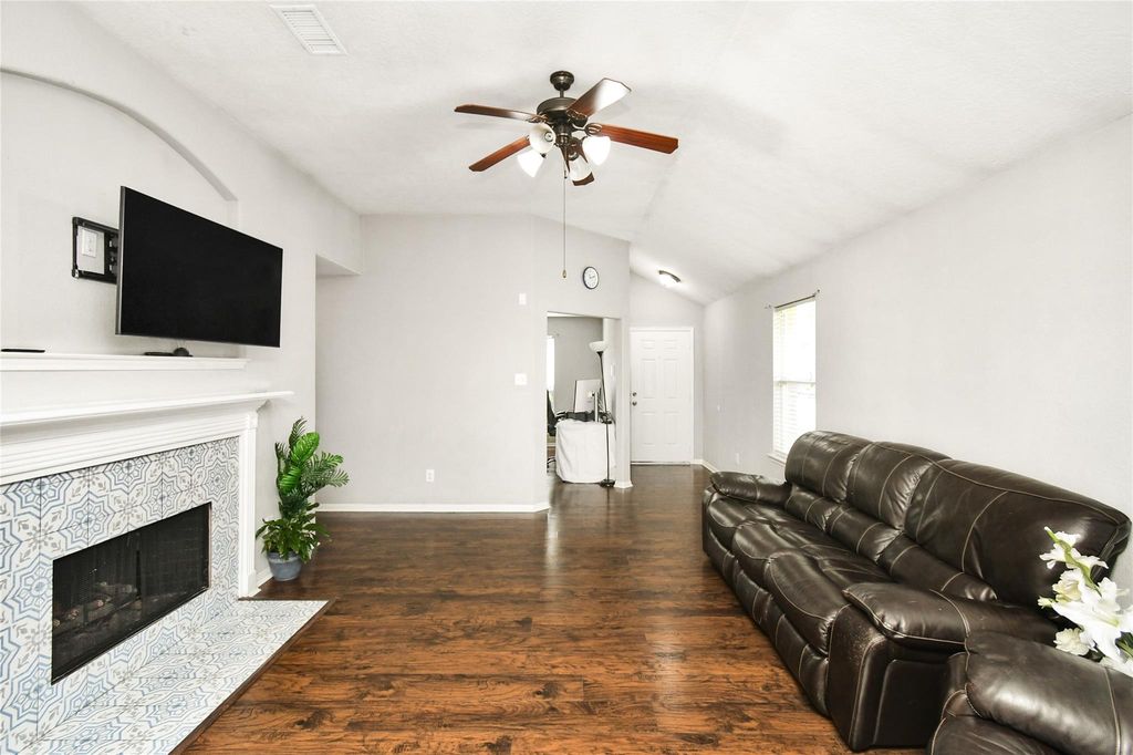 Living room with high ceilings and fireplace