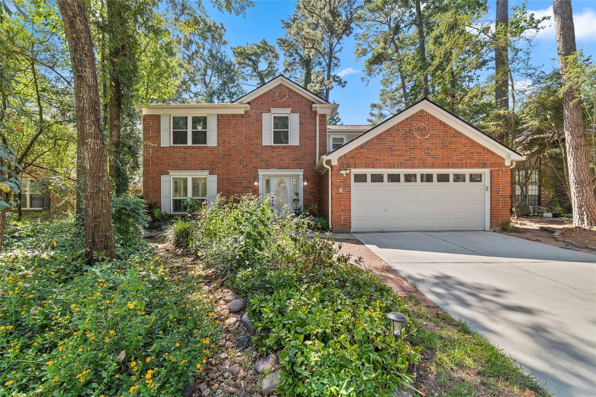 218 E Rainbow Ridge Cir, The Woodlands, TX 77381 cover photo. Doors Open Tour advertisement.