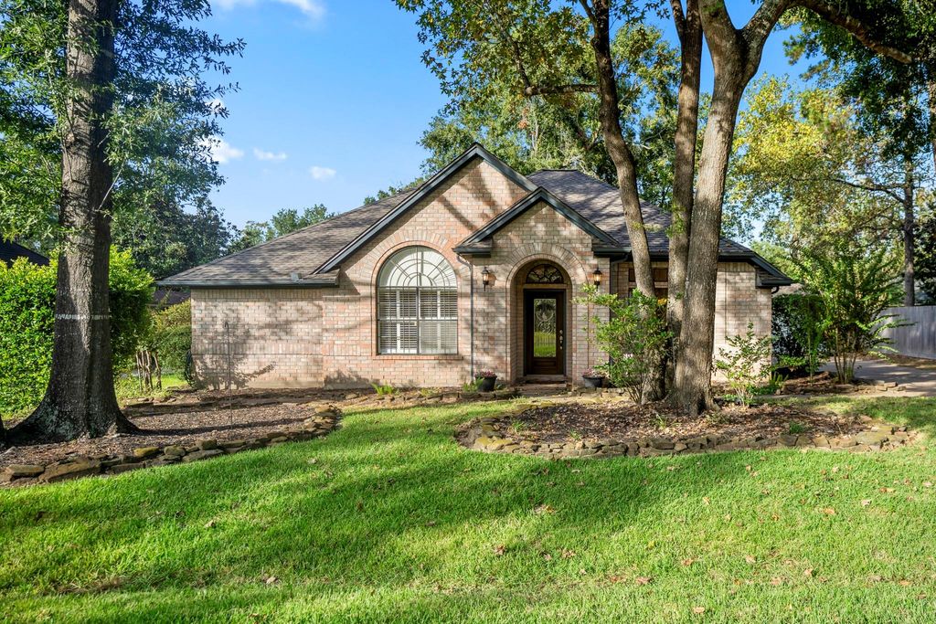 812 Woodland Ln, Conroe, TX 77302 cover photo. Doors Open Tour advertisement.